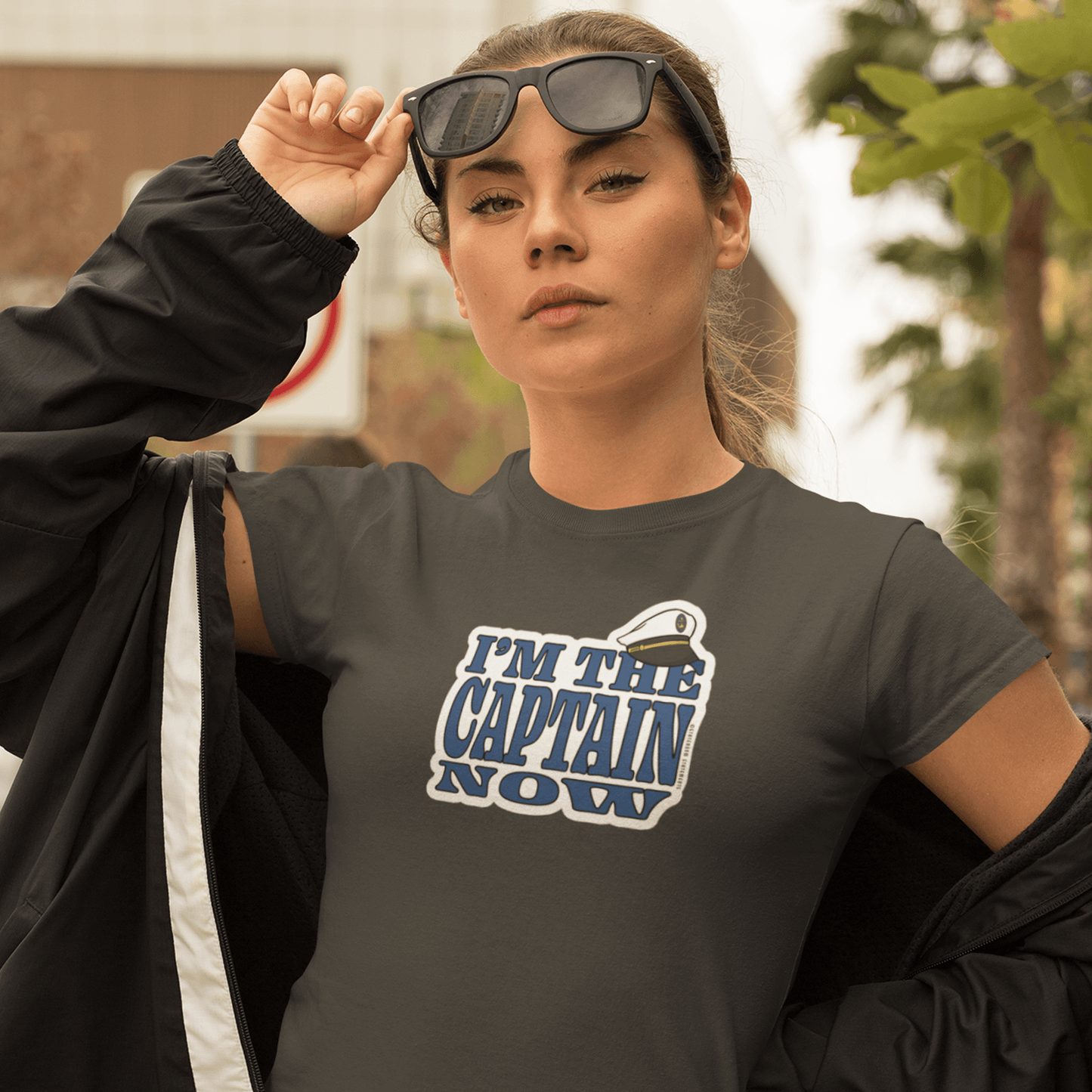 woman wearing sunglasses and cruise shirt
